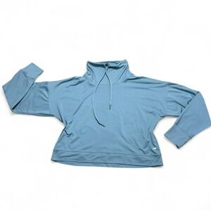Blue long sleeve adjustable mock neck cropped active pullover with thumb holes